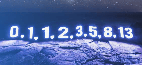 A glowing sequence of numbers 0, 1, 1, 2, 3, 5, 8, 13 displayed on a rocky surface with a dark starry background. The image represents Fibonacci theory and its application in trading and analysis.