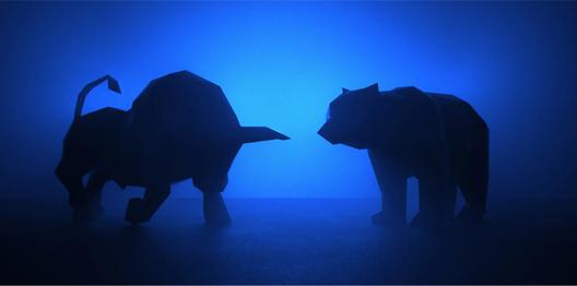Silhouette of bull and bear figures facing each other against a blue gradient background symbolizing market trends