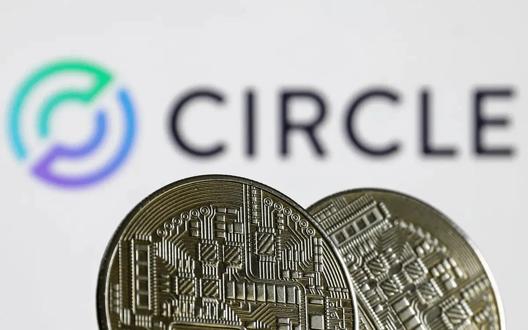Physical USDC stablecoin tokens in front of the Circle logo, representing digital currency and blockchain-based payments