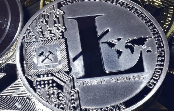 Litecoin coin representing blockchain technology, cryptocurrency trading, and digital assets