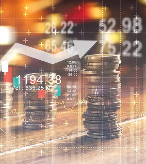 Stacks of coins on a wooden surface with overlaid financial data charts and upward trending arrow representing economic growth.