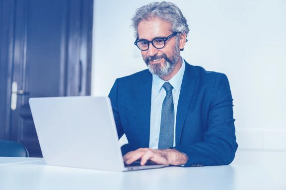 FOREX.com Pro client wearing blue suit