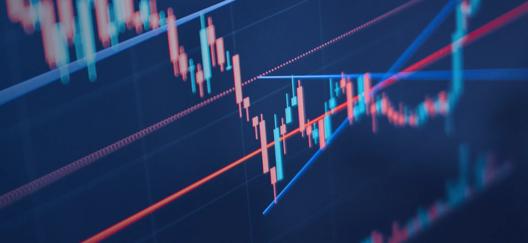 Close up of candlestick chart showing red and green bars representing price movements in financial trading